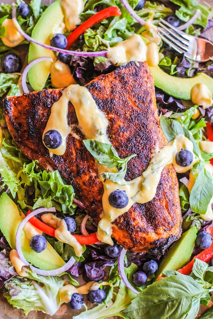 Crispy Jamaican Jerk Salmon Salad with Mango Vinaigrette. A vibrant, healthy dinner recipe!