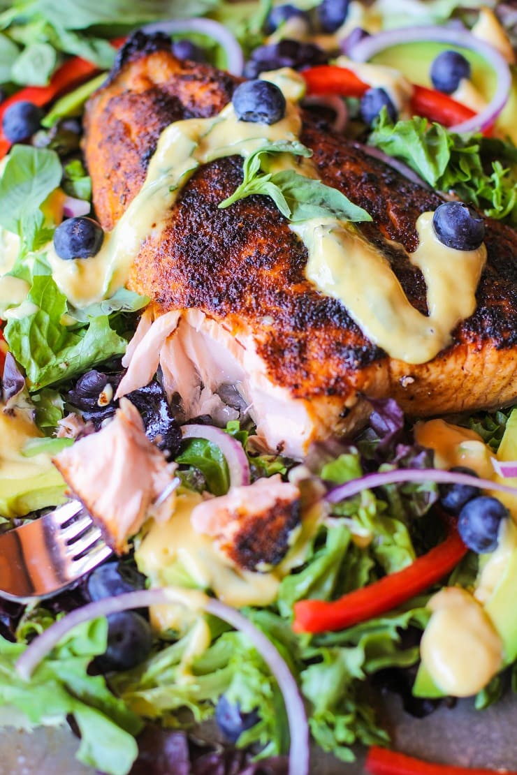 Crispy Jamaican Jerk Salmon Salad with Mango Vinaigrette. A vibrant, healthy dinner recipe!