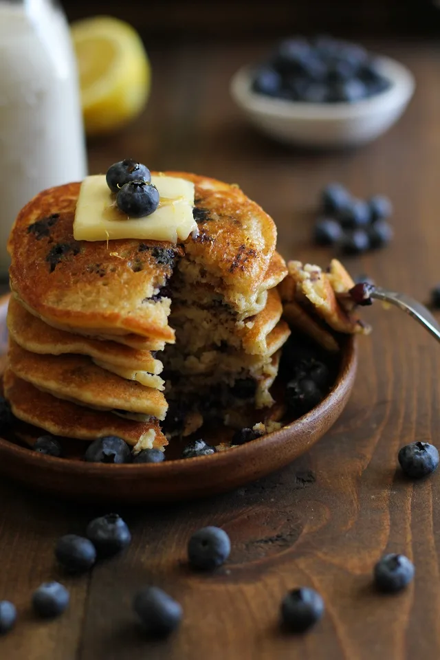 Gluten Free Lemon Blueberry Protein Pancakes made with almond flour + a secret ingredient | TheRoastedRoot.net #healthy #breakfast #recipe