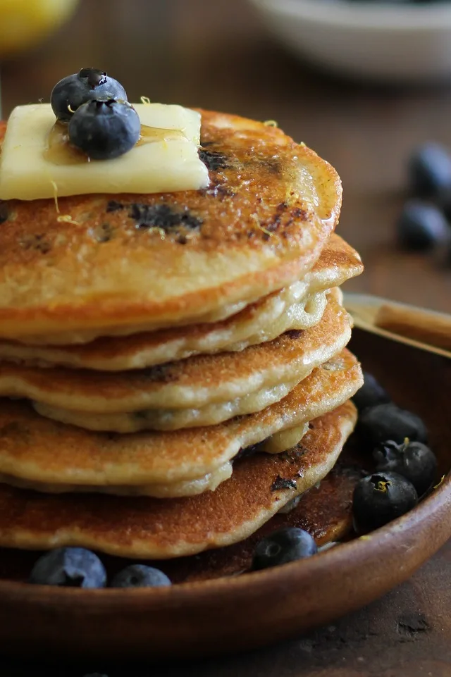 Gluten Free Lemon Blueberry Protein Pancakes made with almond flour + a secret ingredient | TheRoastedRoot.net #healthy #breakfast #recipe