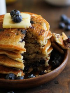 Gluten Free Lemon Blueberry Protein Pancakes made with almond flour + a secret ingredient | TheRoastedRoot.net #healthy #breakfast #recipe