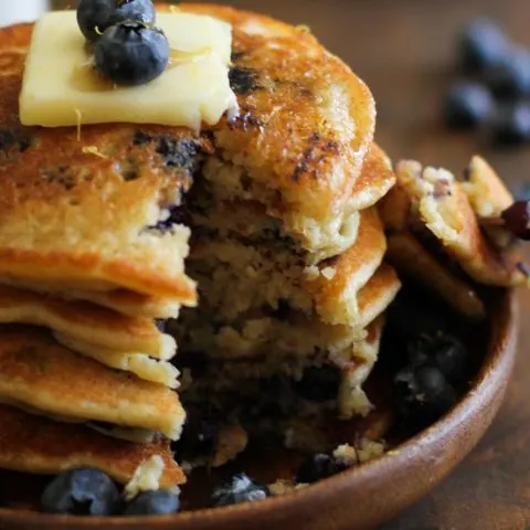 Gluten Free Lemon Blueberry Protein Pancakes made with almond flour + a secret ingredient | TheRoastedRoot.net #healthy #breakfast #recipe