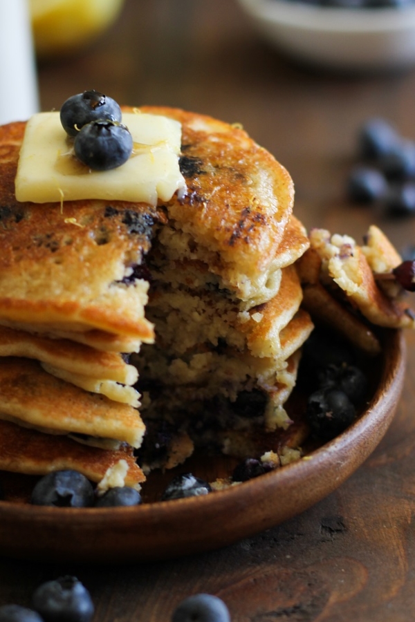 Gluten Free Lemon Blueberry Protein Pancakes made with almond flour + a secret ingredient | TheRoastedRoot.net #healthy #breakfast #recipe