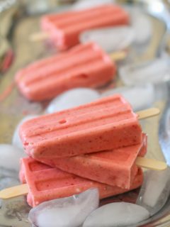 Strawberry Coconut Milk Popsicles - naturally sweetened, dairy-free, vegan, and paleo! #dessert #recipe TheRoastedRoot.net