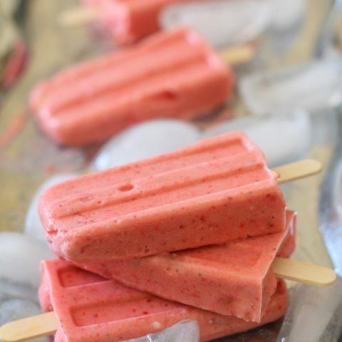 Strawberry Coconut Milk Popsicles - naturally sweetened, dairy-free, vegan, and paleo! #dessert #recipe TheRoastedRoot.net