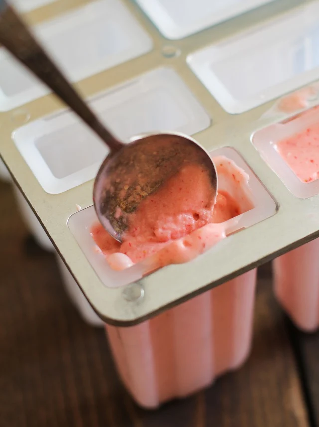 Strawberry Coconut Milk Popsicles - a healthy dessert made vegan with coconut milk and maple syrup | theroastedroot.net #nobake #summer #recipe