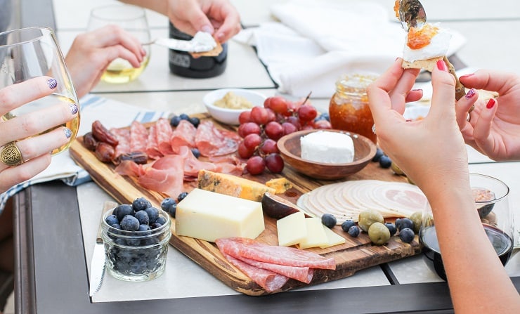 How to Make a Charcuterie Board - tips for selecting meat, wine and cheese pairings, as well as incorporating seasonal ingredients