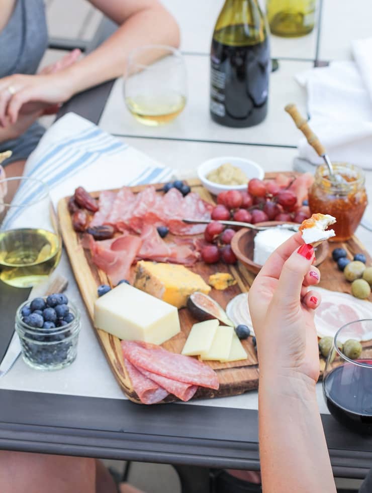 How to Make a Charcuterie Board - tips for selecting meat, wine and cheese pairings, as well as incorporating seasonal ingredients