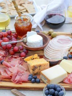 How to Make a Charcuterie Board - tips for selecting meat, wine and cheese pairings, as well as incorporating seasonal ingredients