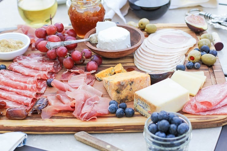 How to Make a Charcuterie Board - tips for selecting meat, wine and cheese pairings, as well as incorporating seasonal ingredients