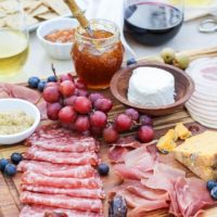 How to Make a Charcuterie Board - tips for selecting meat, wine and cheese pairings, as well as incorporating seasonal ingredients