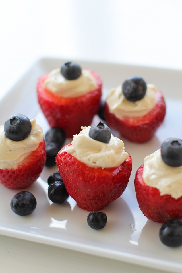 Vegan "Cheesecake" Stuffed Strawberries - naturally sweetened and healthy! | theroastedroot.net #vegan #paleo #dessert Make these treats for the 4th of July!