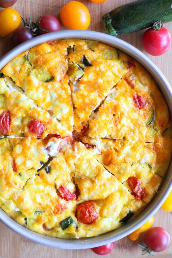 Goat Cheese, Tomato, and Zucchini Frittata in a baking pan.