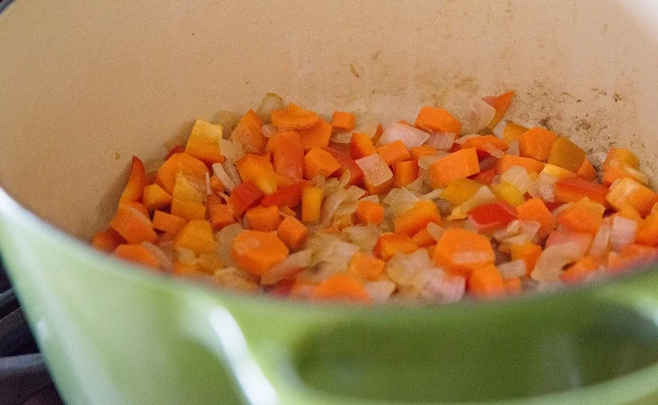 Saute the vegetables for corn chowder