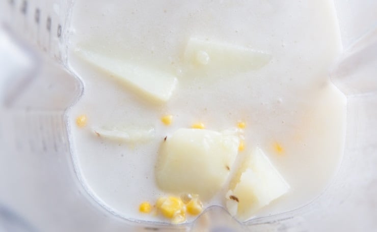 Make corn chowder broth by blending coconut milk, corn, and potatoes in a blender