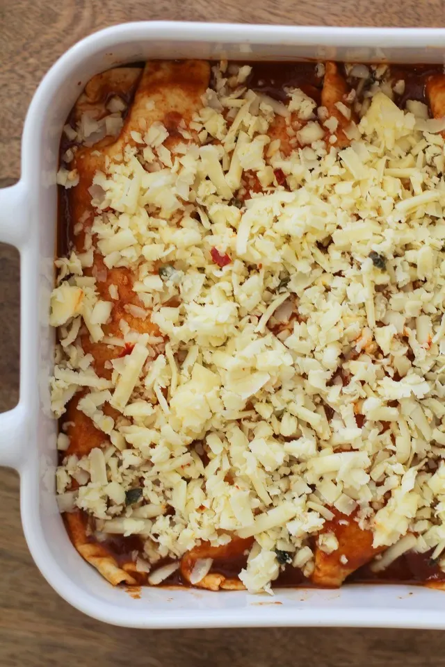 Small Batch Sweet Potato and Black Bean Enchiladas - the perfect dinner for two! | TheRoastedRoot.net #healthy #vegetarian #recipe