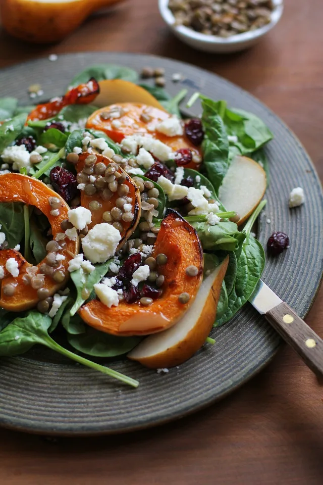 Roasted Butternut Squash and Pear Salad with lentils, feta cheese, dried cranberries, and citrus sage vinaigrette | TheRoastedRoot.net #healthy #superfood #salad #recipe #fall