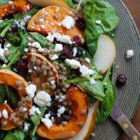 Roasted Butternut Squash and Pear Salad with lentils, feta cheese, dried cranberries, and citrus sage vinaigrette | TheRoastedRoot.net #healthy #superfood #salad #recipe #fall