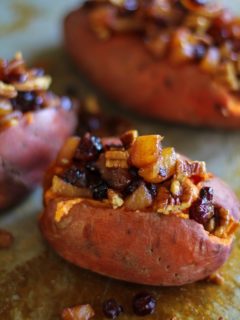 Stuffed Sweet Potatoes with yogurt, caramelized pears, pecans, and dried cranberries #healthy #sidedish #recipe #holiday #Thanksgiving TheRoastedRoot.net