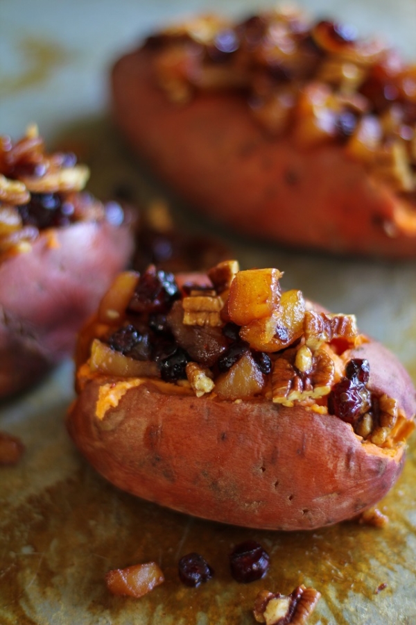 Stuffed Sweet Potatoes with yogurt, caramelized pears, pecans, and dried cranberries #healthy #sidedish #recipe #holiday #Thanksgiving TheRoastedRoot.net