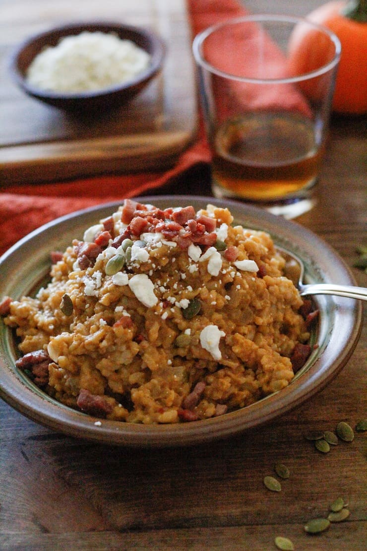 Creamy Bourbon-Spiked Pumpkin Risotto with Prosciutto and Goat Cheese - a tasty gluten-free, dairy-free recipe for holiday gatherings | TheRoastedRoot.net