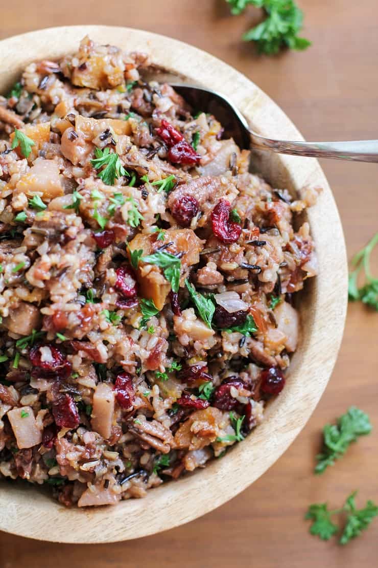 Wild Rice Stuffing with Butternut Squash, cranberries, and pecans. This healthy gluten-free stuffing recipe is perfect for the holidays