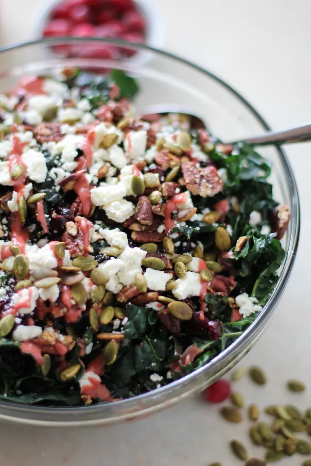 Cranberry Kale Salad with Roasted Pecans and Feta | TheRoastedRoot.net #healthy #superfood #recipe #vegetarian