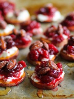 Sweet Potato Rounds with Goat Cheese, Roasted Cranberries, @bluediamond almonds, and honey TheRoastedRoot.net #healthy #appetizer