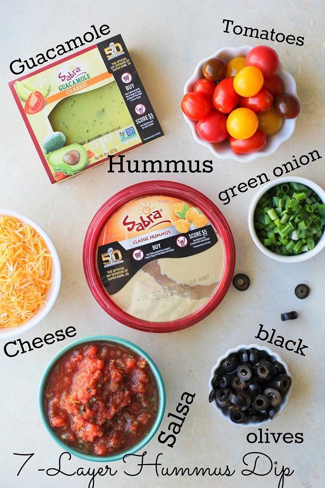 7-Layer Hummus Dip with @sabradippingco hummus | TheRoastedRoot.net #healthy #ad #superbowl