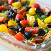 7-Layer Hummus Dip with @sabradippingco hummus | TheRoastedRoot.net #healthy #ad #superbowl