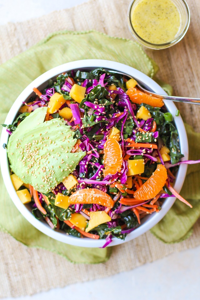 Crunchy Kale and Mandarin Salad with Avocado, Mango, and Lemon Poppy Seed Dressing | TheRoastedRoot.net #superfood #vegan #recipe #paleo