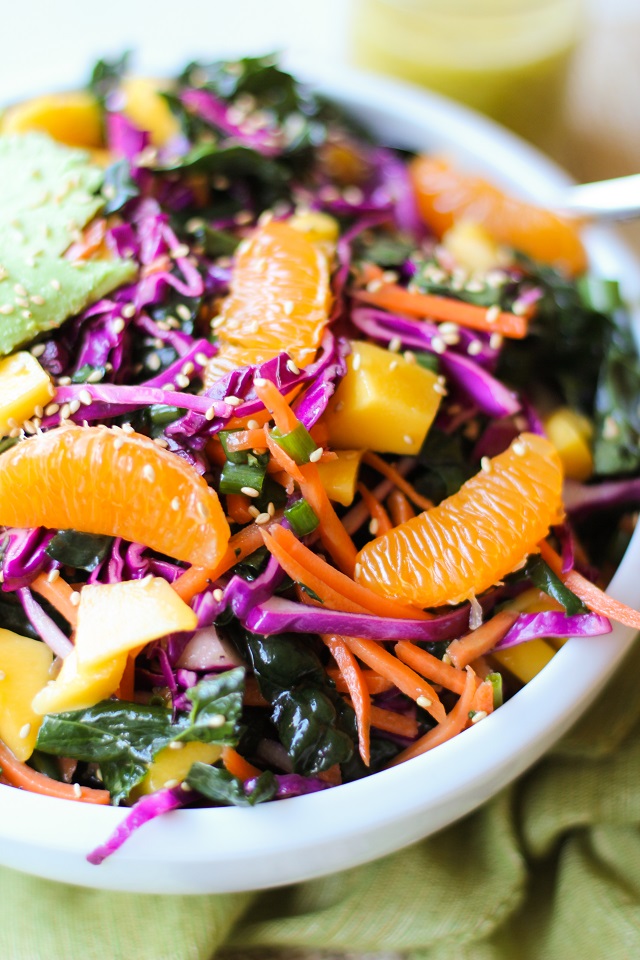 Crunchy Kale and Mandarin Salad with Avocado, Mango, and Lemon Poppy Seed Dressing | TheRoastedRoot.net #superfood #vegan #recipe #paleo