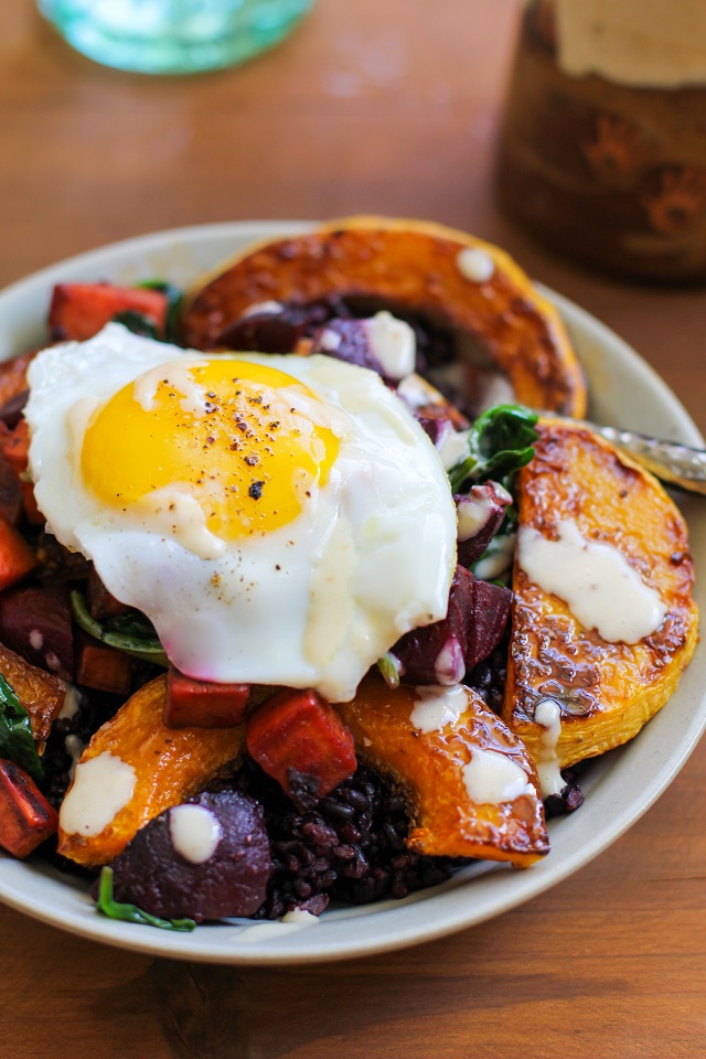 Roasted butternut squash, beet, and sweet potato forbidden rice bowls with maple tahini sauce | TheRoastedRoot.net #healthy #recipe #vegetarian