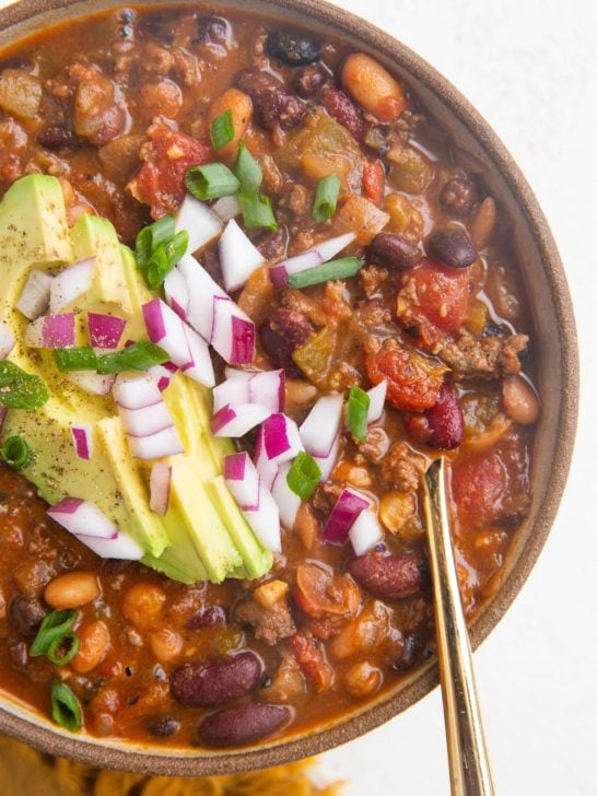 Close up top down photo of a big bowl of healthy turkey chili