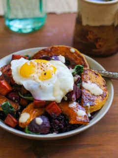 Roasted butternut squash, beet, and sweet potato forbidden rice bowls with maple tahini sauce | TheRoastedRoot.net #healthy #recipe #vegetarian