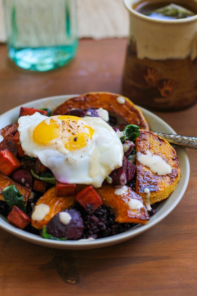 Roasted butternut squash, beet, and sweet potato forbidden rice bowls with maple tahini sauce | TheRoastedRoot.net #healthy #recipe #vegetarian