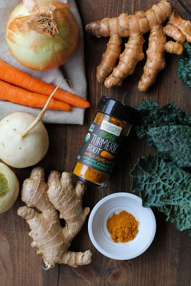 Ginger and Turmeric Braised Chicken with turnips, kale, and carrots in coconut milk broth | TheRoastedRoot.net #healthy #dinner #recipe 