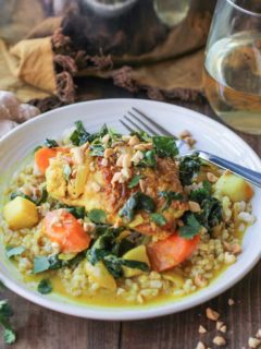 Ginger-Turmeric Braised Chicken with Rice and Root Vegetables - an incredibly nutritious one-pot meal. #paleo #healthy