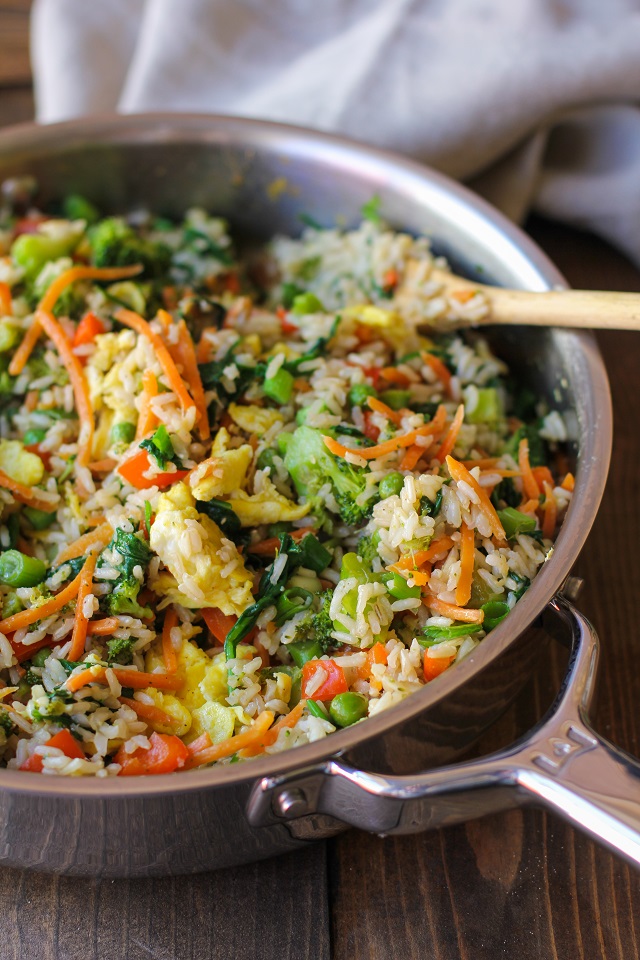 Fully-Loaded Vegetable Fried Rice with broccoli, carrot, bell pepper, spinach, and peas | TheRoastedRoot.net #healthy #recipe #vegetarian