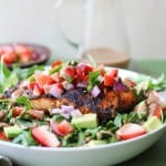 Grilled salmon arugula salad with strawberry salsa, avocado, and strawberry balsamic vinaigrette - a healthful and vibrant meal | TheRoastedRoot.net #dinner #recipe #paleo