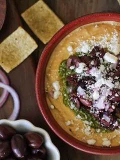Mediterranean Hummus with Pesto and Feta | TheRoastedRoot.net #appetizer #healthy #recipe