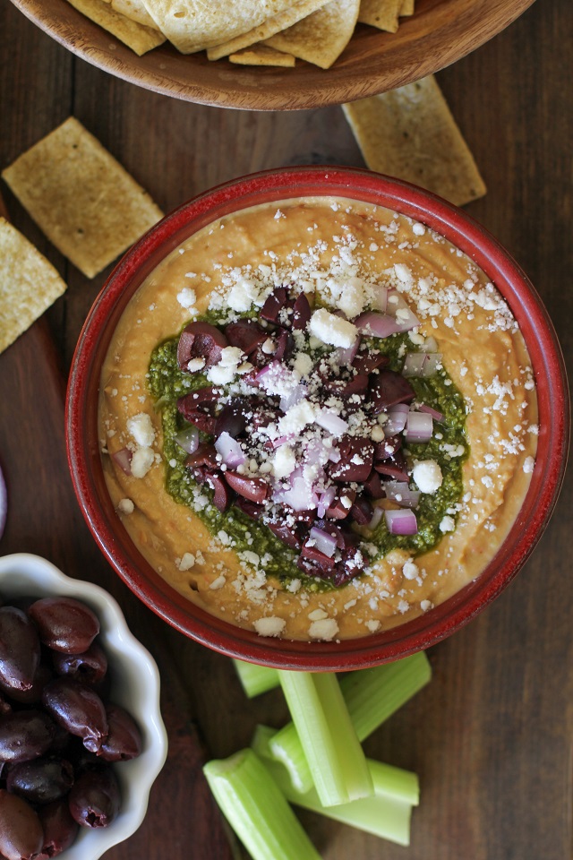 Mediterranean Hummus with Pesto and Feta | TheRoastedRoot.net #appetizer #healthy #recipe