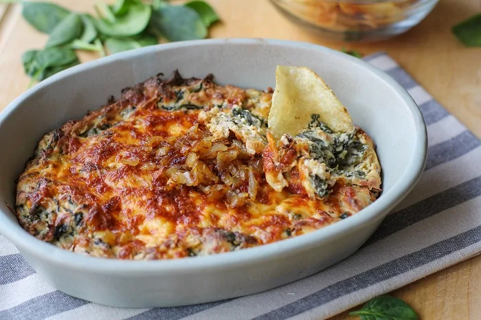 Spinach and Caramelized Onion Dip | TheRoastedRoot.net #cheese #appetizer #glutenfree