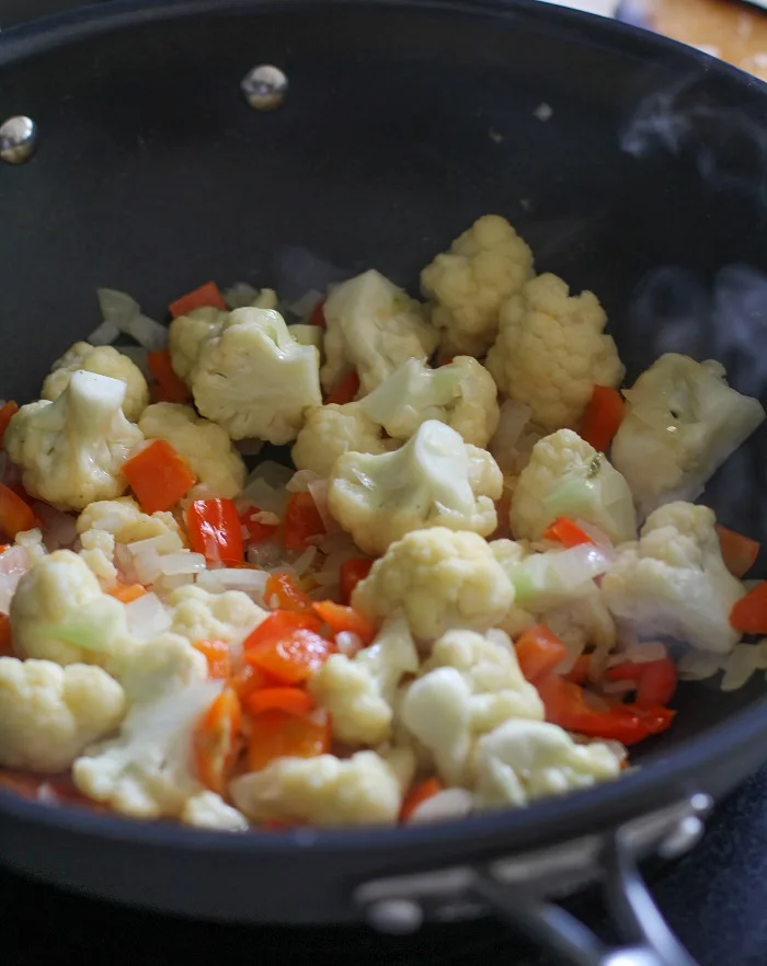 6-Ingredient 30-Minute Vegetarian Curry with cauliflower and bell pepper | TheRoastedRoot.net #healthy #vegetarian #recipe #vegan #meatlessmondays #30minutemeal