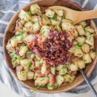 German-Style Potato Salad with bacon, caramelized onions, and chives | TheRoastedRoot.net #sidedish #recipe #picnic #bbq #summer #4thofjuly