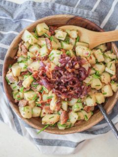 German-Style Potato Salad with bacon, caramelized onions, and chives | TheRoastedRoot.net #sidedish #recipe #picnic #bbq #summer #4thofjuly