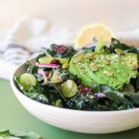 Lemon Basil Kale Salad with grapes, pumpkin seeds, and avocado | TheRoastedRoot.net #healthy #salad #recipe #detox #vegan #vegetarian