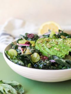 Lemon Basil Kale Salad with grapes, pumpkin seeds, and avocado | TheRoastedRoot.net #healthy #salad #recipe #detox #vegan #vegetarian