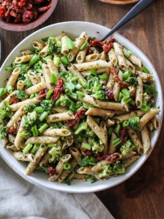 Kale Pesto Pasta Salad with Sun-Dried Tomatoes and Broccoli - a healthy side dish for summer BBQs and picnics | TheRoastedRoot.net #glutenfree