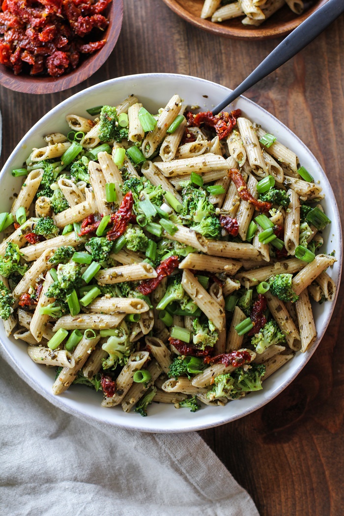 Kale Pesto Pasta Salad with Sun-Dried Tomatoes and Broccoli - a healthy side dish for summer BBQs and picnics | TheRoastedRoot.net #glutenfree